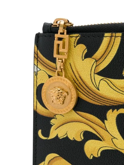 Shop Versace Printed Pouch Clutch - Black