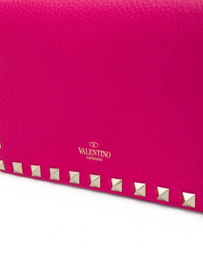 Shop Valentino Garavani Rockstuds Mini Bag - Pink