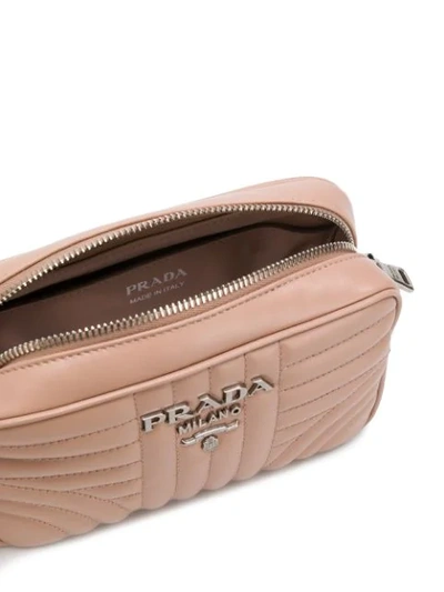 Shop Prada Diagramme Quilted Crossbody Bag In Pink