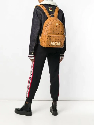 Shop Mcm Printed Logo Backpack In Brown