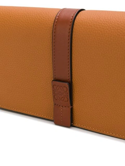 Shop Loewe Crossbody Clutch Bag In Brown
