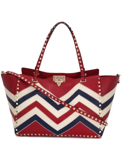 Shop Valentino Garavani Rockstud Trapeze Tote - Red