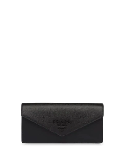 Shop Prada Monochrome Saffiano Clutch Bag In Black