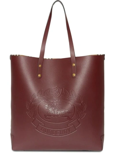 Shop Burberry Embossed Crest Leather Tote In Burgundy