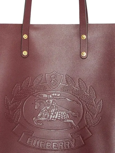 Shop Burberry Embossed Crest Leather Tote In Burgundy