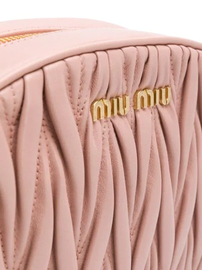 Shop Miu Miu Matelassé Crossbody Bag - Pink