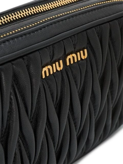 Shop Miu Miu Mini Matelassé Crossbody Bag In Black