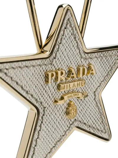 Shop Prada Star Tag - Metallic