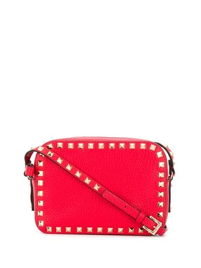 Shop Valentino Rockstud Crossbody Bag In Red