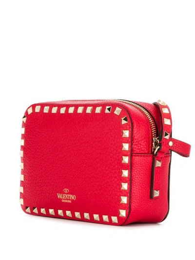 Shop Valentino Rockstud Crossbody Bag In Red