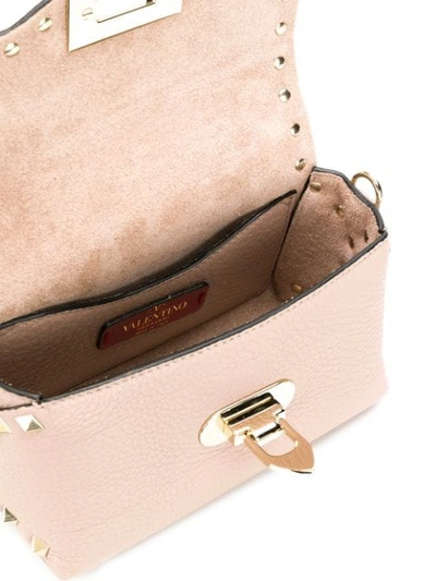 Shop Valentino Garavani Rockstud Crossbody Bag In P45 Poudre