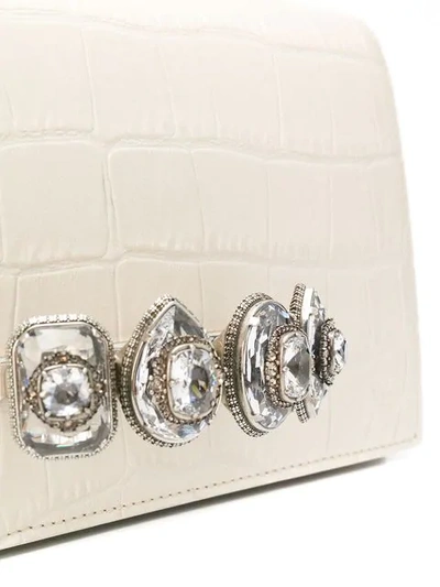 Shop Alexander Mcqueen Ring Embellished Crossbody Bag In Neutrals
