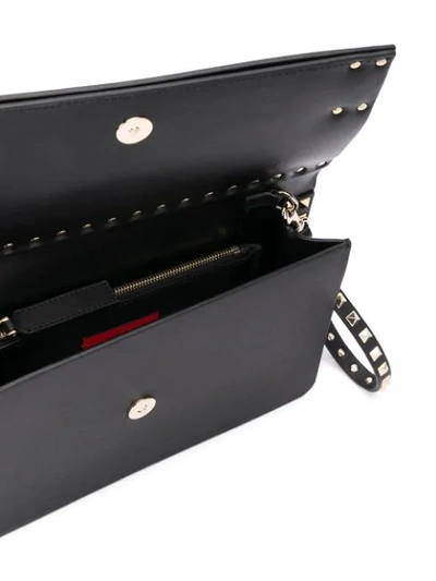 Shop Valentino Garavani 'rockstud' Clutch In Black