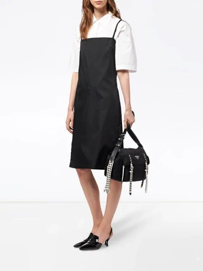 Shop Prada Studded Strap Shoulder Bag In Black