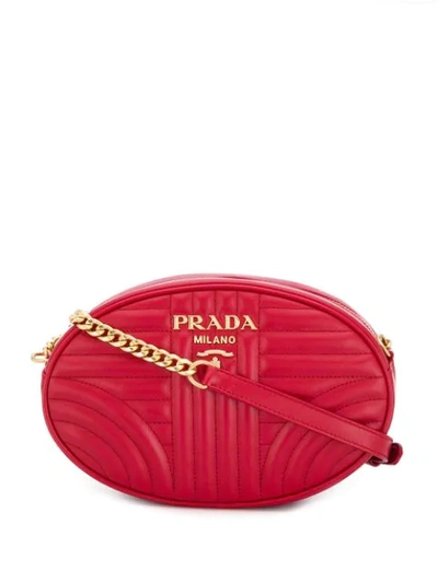 Shop Prada Quilted Logo Cross Body Bag In Red