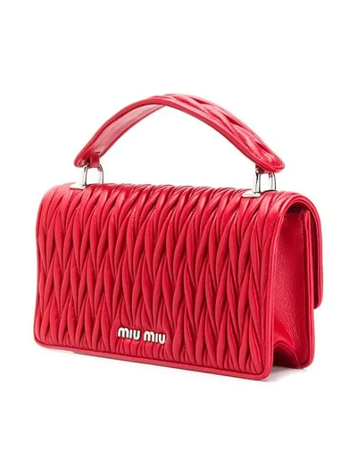 Shop Miu Miu Matelassé-schultertasche In Red