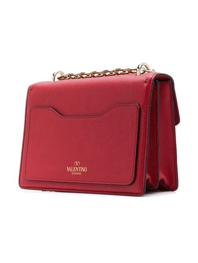 Shop Valentino Garavani Embossed Shoulder Bag In Red