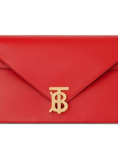 Shop Burberry Small Leather Tb Envelope Clutch In Red