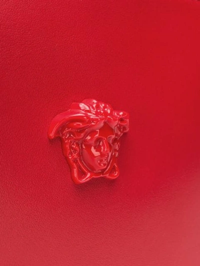 Shop Versace Palazzo Medusa Wristlet Clutch Bag - Red
