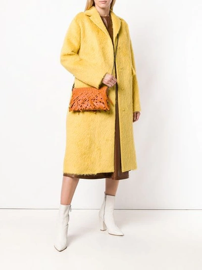 Shop Bottega Veneta Fringed Crossbody Bag In Yellow