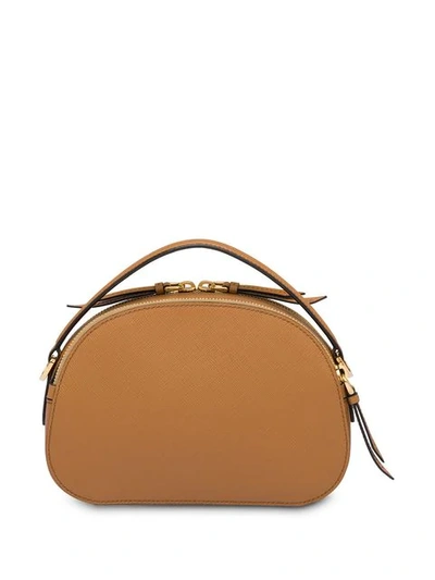 Shop Prada Odette Saffiano Leather Bag In Brown
