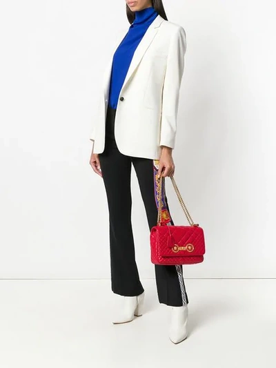 Shop Versace Quilted Shoulder Bag In Red