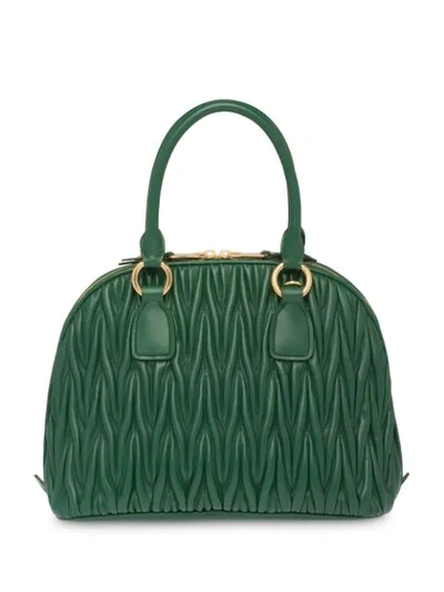 Shop Miu Miu Matelassé Top-handle Bag In Green