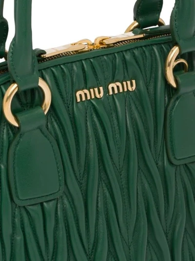 Shop Miu Miu Matelassé Top-handle Bag In Green