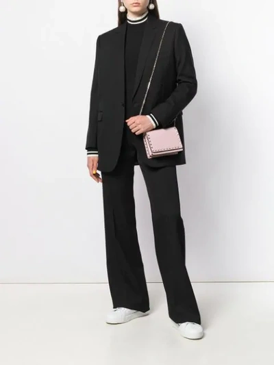 Shop Valentino Small Rockstud Crossbody Bag In Pink