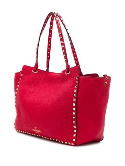 Shop Valentino Garavani Medium  Garavani Rockstud Tote Bag - Red