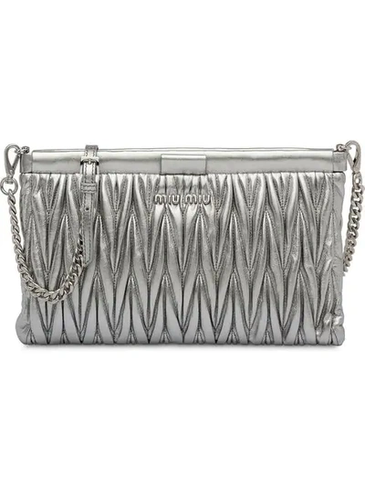 Shop Miu Miu Matelassé Clutch Bag In Silver