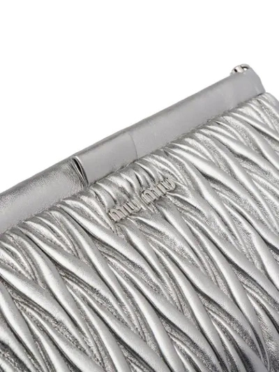 Shop Miu Miu Matelassé Clutch Bag In Silver