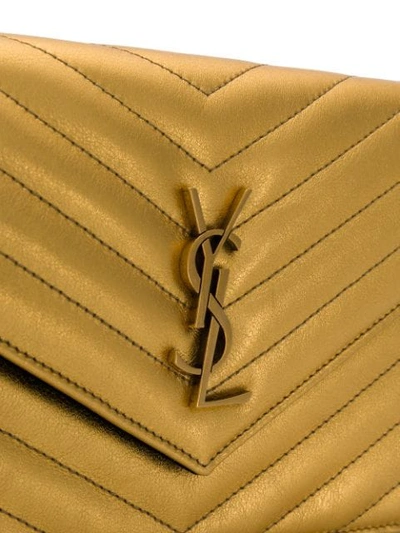 Shop Saint Laurent Monogram Envelope Cross-body Bag In Gold
