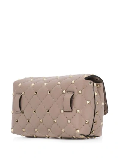 Shop Valentino Rockstud Spike Belt Bag In Pink