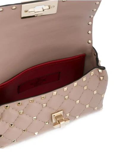 Shop Valentino Rockstud Spike Belt Bag In Pink