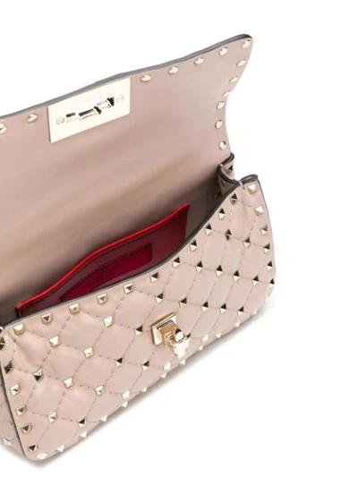 Shop Valentino Rockstud Spike Crossbody Bag In Neutrals
