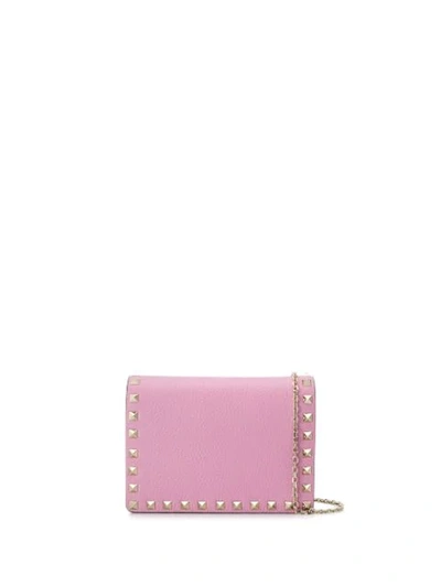 Shop Valentino Garavani Rockstud Clutch In Pink