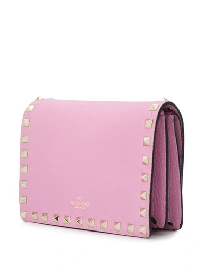 Shop Valentino Garavani Rockstud Clutch In Pink