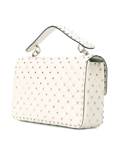 Shop Valentino Rockstud Spike Crossbody Bag In Neutrals