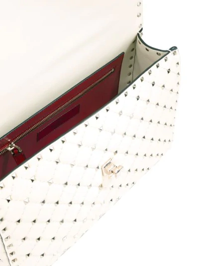 Shop Valentino Rockstud Spike Crossbody Bag In Neutrals