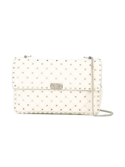 Shop Valentino Rockstud Spike Crossbody Bag In Neutrals