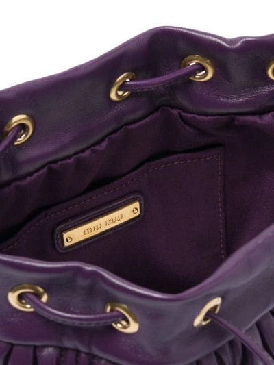 Shop Miu Miu Matelassé Drawstring Bucket Bag In Purple