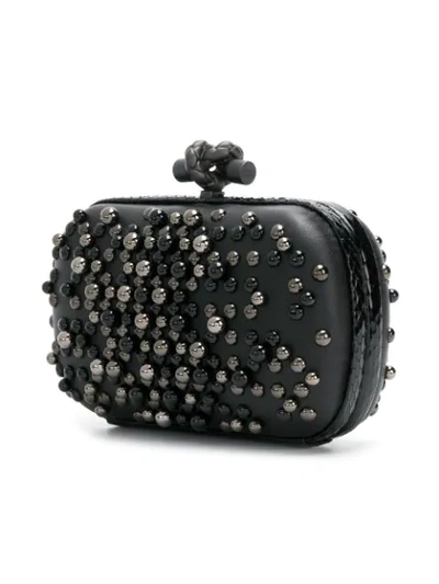 Shop Bottega Veneta Studded Chain Knot Clutch Bag In 1000 Black