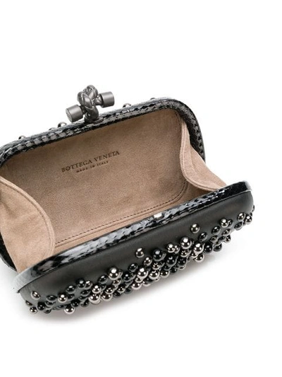 Shop Bottega Veneta Studded Chain Knot Clutch Bag In 1000 Black