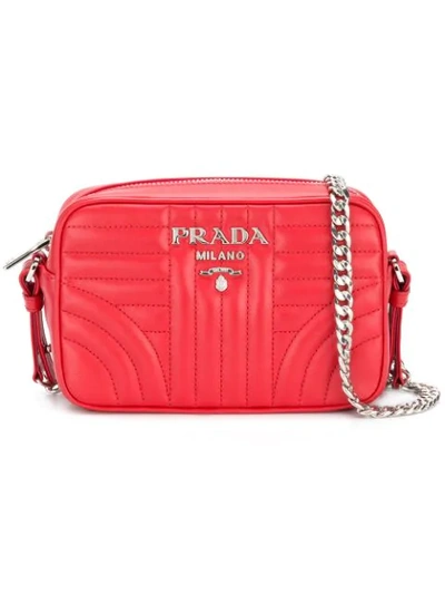 Shop Prada Bevelled Leather Cross-body Bag In Red