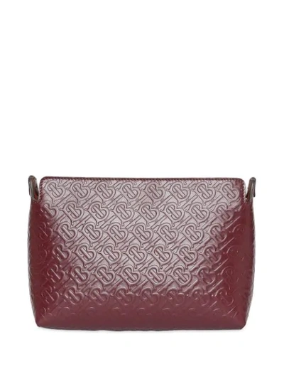 Shop Burberry Medium Monogram Leather Clutch In Red