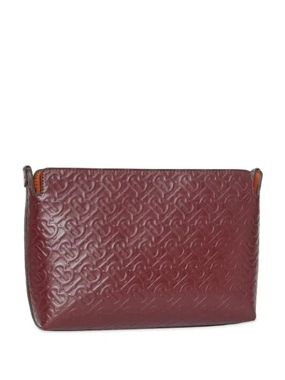 Shop Burberry Medium Monogram Leather Clutch In Red