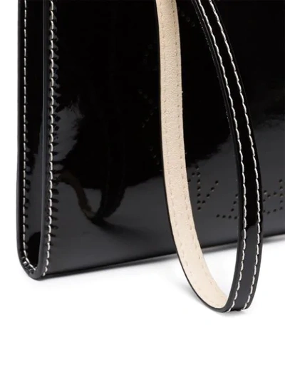 Shop Stella Mccartney Black Logo Print Faux Leather Zip Clutch Bag In 1000 Black