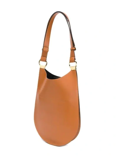 Shop Marni Curved Flat Shoulder Bag In Brown