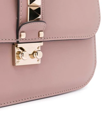 Shop Valentino Garavani Glam Lock Shoulder Bag - Neutrals